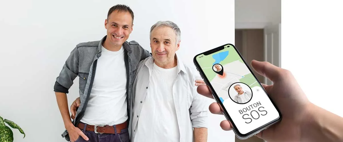 Un homme et son pere sembrassent et un telephone avec la localisation de son pere